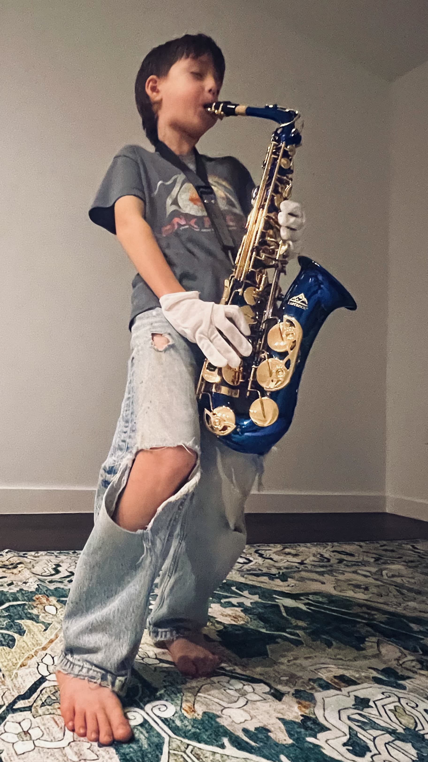 Mark XChristos playing saxophone